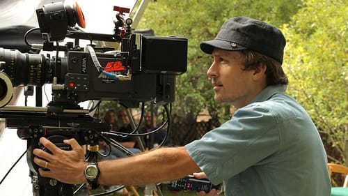 Andrew K. Sachs operating a camera